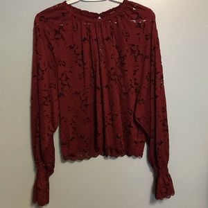 Free people lace top in burgundy. Size small.